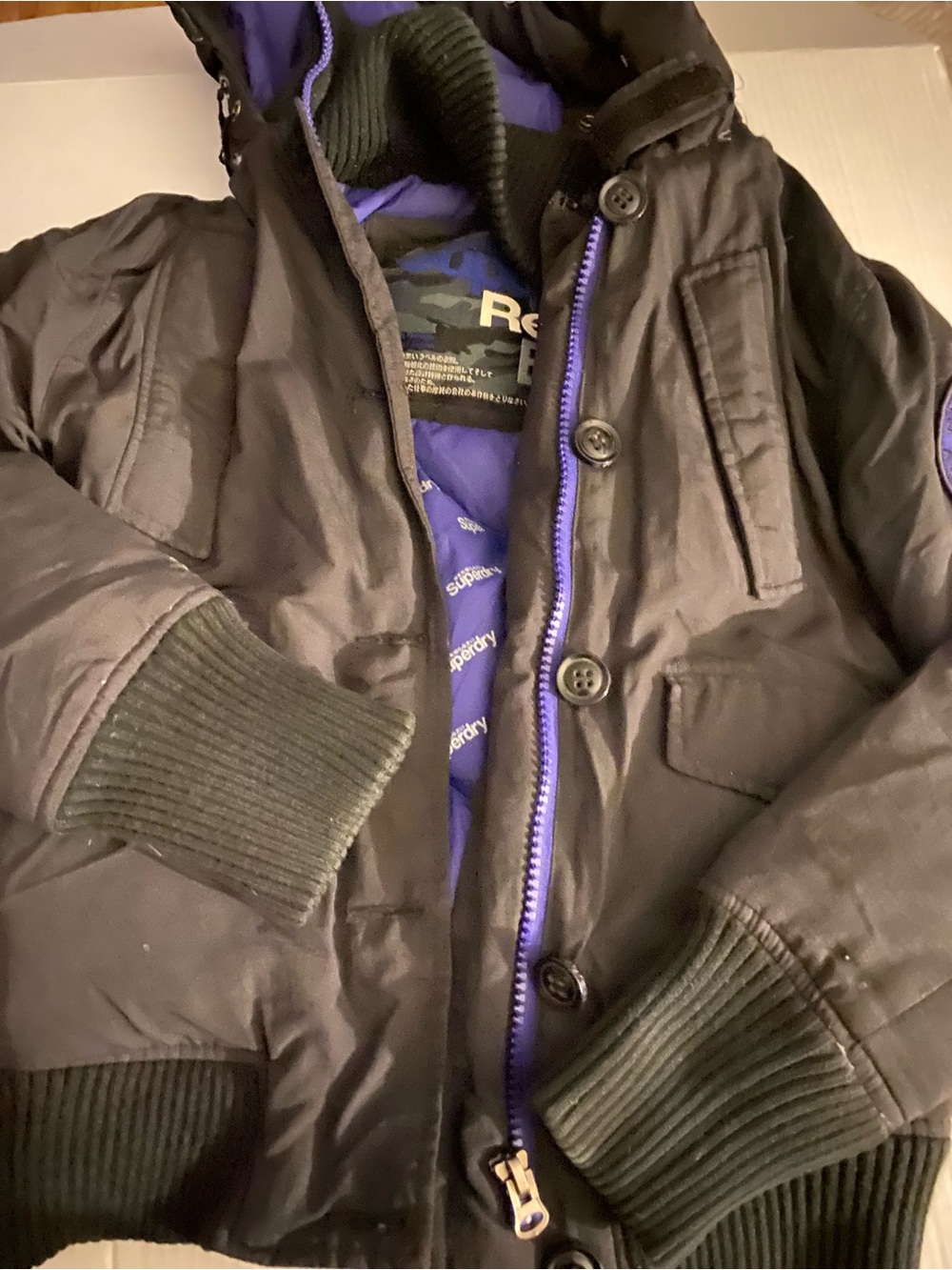 Superdry Men’s Black Puffer Jacket with Purple Lining Accent